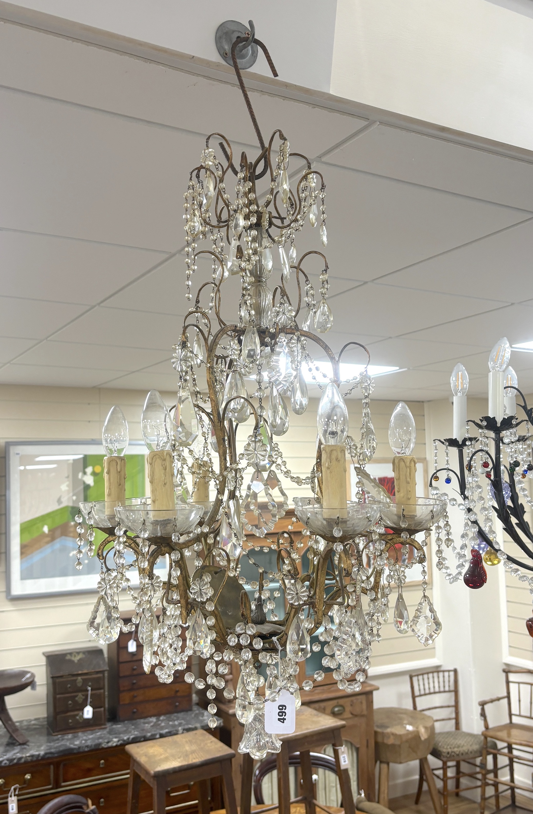 A six branch gilt metal and glass lustre chandelier, 79cm high